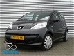 Peugeot 107 - 1.0 12V 68PK 5DRS. Dealer onderhouden - 1 - Thumbnail