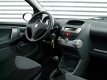 Peugeot 107 - 1.0 12V 68PK 5DRS. Dealer onderhouden - 1 - Thumbnail