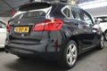 BMW 2-serie Active Tourer - 218i NAVIGATIE LIMIT CONTROL AIRCO BLUETOOTH TEL MEDIA VOORBEREIDING PDC - 1 - Thumbnail