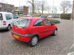 Opel Corsa - 1.2-16V Comfort 1 jaar apk - 1 - Thumbnail