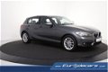 BMW 1-serie - 116d M-Style *Navigatie*Park Assist*Led*Keyless - 1 - Thumbnail