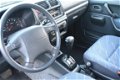 Suzuki Jimny - 1.3 JLX automaat Airco - 1 - Thumbnail