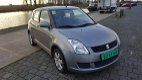 Suzuki Swift - 1.3 Comfort - 1 - Thumbnail