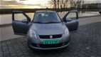 Suzuki Swift - 1.3 Comfort - 1 - Thumbnail