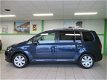 Volkswagen Touran - 1.2 TSI Comfl. BlueM. Trekhaak, Navigatie - 1 - Thumbnail