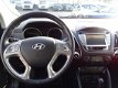 Hyundai ix35 - 2.0i i-Catcher *Navi/Leder/Open dak/Trekhaak - 1 - Thumbnail