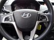 Hyundai i20 - 1.4i DynamicVersion 101 PK, Airco, Elek-Pakket - 1 - Thumbnail