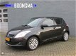 Suzuki Swift - 1.2 95pk 5drs Exclusive Clima Cruise 16'velgen - 1 - Thumbnail