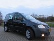 Volkswagen Caddy - 1.4i Benzine met Airco & 2 Schuifdeuren - 1 - Thumbnail