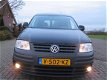 Volkswagen Caddy - 1.4i Benzine met Airco & 2 Schuifdeuren - 1 - Thumbnail