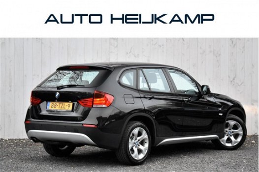 BMW X1 - sDrive18i Automaat | Airco | Stoelverwarming | 89.490km - 1