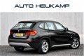 BMW X1 - sDrive18i Automaat | Airco | Stoelverwarming | 89.490km - 1 - Thumbnail