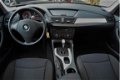 BMW X1 - sDrive18i Automaat | Airco | Stoelverwarming | 89.490km - 1 - Thumbnail