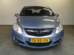 Opel Corsa - 1.4-16V Enjoy 17 Inch / Airco / 5-deurs / NAP - 1 - Thumbnail