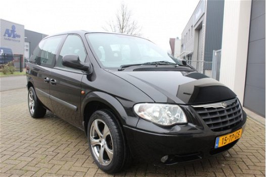 Chrysler Voyager - 2.4i LX Luxe /Navigatie/7 Persoons/Pdc/Cruise control/Rijklaar - 1