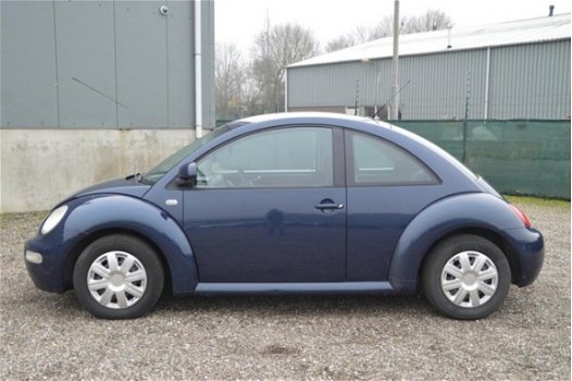 Volkswagen New Beetle - 2.0 Highline - 1