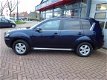 Mitsubishi Outlander - 2.4 Edition 4WD, AIRCO, TREKH, LMV, EL PAKKET - 1 - Thumbnail