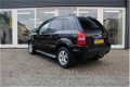 Hyundai Tucson - 2.0i Dynamic Executive, NAVIGATIE, CRUISE CONTROL, PDC ACHTER, TREKHAAK, PRIJS IS R - 1 - Thumbnail