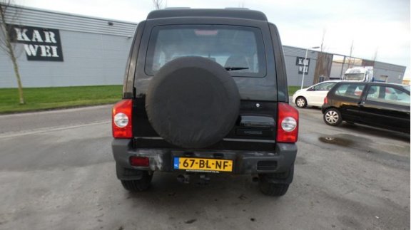 SsangYong Korando - 2.9 TD / grijs kenteken / 3500kg trekgewicht / airco / trekhaak - 1