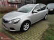 Kia Cee'd Sporty Wagon - 1.4 CVVT X-ecutive - 1 - Thumbnail