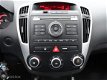 Kia Cee'd Sporty Wagon - 1.4 CVVT X-ecutive - 1 - Thumbnail