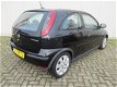 Opel Corsa - 1.4-16V Sport - 1 - Thumbnail