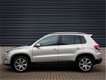 Volkswagen Tiguan - 2.0 TSI Sport&Style 4Motion Panodak/Xenon/Navi/Cruise/Leder/Trekhaak - 1 - Thumbnail