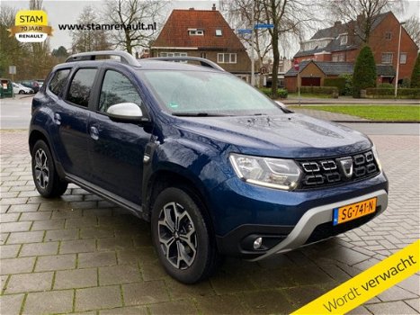 Dacia Duster - TCe 125pk Prestige Navig., Climate, Cruise, Lichtm. velg - 1