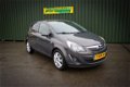 Opel Corsa - 1.4i 100pk 5-drs + Navi / Trekhaak / PDC / Mooie auto - 1 - Thumbnail