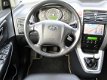 Hyundai Tucson - 2.0i Style, Trekhaak 1400 KG / Leder / Cruise control / Elektr. schuifdak - 1 - Thumbnail