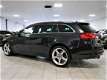 Opel Insignia Sports Tourer - 2.0 T Cosmo 4x4 *Sportleder/Panoramdak* Navigatie/Xenon/19 Inch 220pk - 1 - Thumbnail