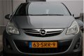 Opel Corsa - 1.2-16V Cosmo | Dealer onderhouden | Navi | Cruise | - 1 - Thumbnail