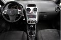 Opel Corsa - 1.2-16V Cosmo | Dealer onderhouden | Navi | Cruise | - 1 - Thumbnail