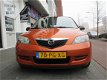 Mazda 2 - 2 1.4 Exclusive 5 Deurs Airco - 1 - Thumbnail