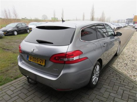 Peugeot 308 SW - 1.6 BlueHDI Blue Lease Limited Trekhaak Panoramadak Navi Clima PDC Bluetooth Cruise - 1