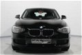 BMW 1-serie - 114i 102pk 5 Drs Airco, LMV, Radio/CD, Stoelverwarming, Slechts 95 dkm - 1 - Thumbnail