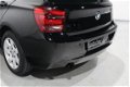 BMW 1-serie - 114i 102pk 5 Drs Airco, LMV, Radio/CD, Stoelverwarming, Slechts 95 dkm - 1 - Thumbnail