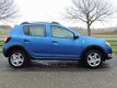 Dacia Sandero - TCe 90pk Stepway | HOGE INSTAP | RIJKLAARPRIJS INCLUSIEF AFLEVERPAKKET T.W.V. € 695, - 1 - Thumbnail