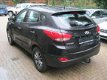 Hyundai ix35 - 1.6i GDI Business Edition /NAVIGATIE-CAMERA/LED dagrijverlichting/TREKHAAK/*37809KM*/ - 1 - Thumbnail