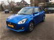 Suzuki Swift - 1.2 Stijl navigatie, cruise controle, climate control, two-tone velgen, stoelverwarmi - 1 - Thumbnail