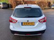 Suzuki SX4 S-Cross - 1.6 Urban cruise control, airco, zomer en winterbanden, armsteun bluetooth, 2e - 1 - Thumbnail