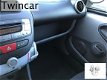 Toyota Aygo - 1.0 12v VVT-i + 5-DRS AIRCO NAP - 1 - Thumbnail