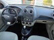 Ford Fiesta - 1.4-16V Ghia -5DRS.-AIRCO-TREKHAAK-VOORRUITVERWARMING-RADIO/CD/AUX - 1 - Thumbnail