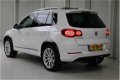 Volkswagen Tiguan - 2.0 TSI R-Line 4-Motion Panoramadak | Navigatie | trekhaak | Alarm | - 1 - Thumbnail