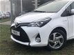 Toyota Yaris - 1.5 Full Hybrid Trend | Navigatie, LM Velgen, Mistlampen - 1 - Thumbnail