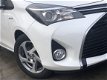 Toyota Yaris - 1.5 Full Hybrid Trend | Navigatie, LM Velgen, Mistlampen - 1 - Thumbnail