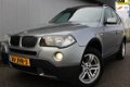 BMW X3 - 2.0d High Executive Panoramadak Airco Navigatie Automaat Leder Dvd Speler - 1 - Thumbnail