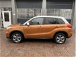 Suzuki Vitara - 1.6 Exclusive Navigatie 17inch Cruise Cv Hoge zit 2015 km 72.000 - 1 - Thumbnail