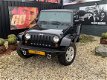 Jeep Wrangler Unlimited - JK -BENZINE-AUTOMAAT-LUXE - 1 - Thumbnail