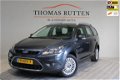 Ford Focus Wagon - 1.6 TDCi Limited 2010/ NAP/ Navi/ PDC/ Keyless Go/ Trekhaak/ Clima/ Cruise/ Stuur - 1 - Thumbnail